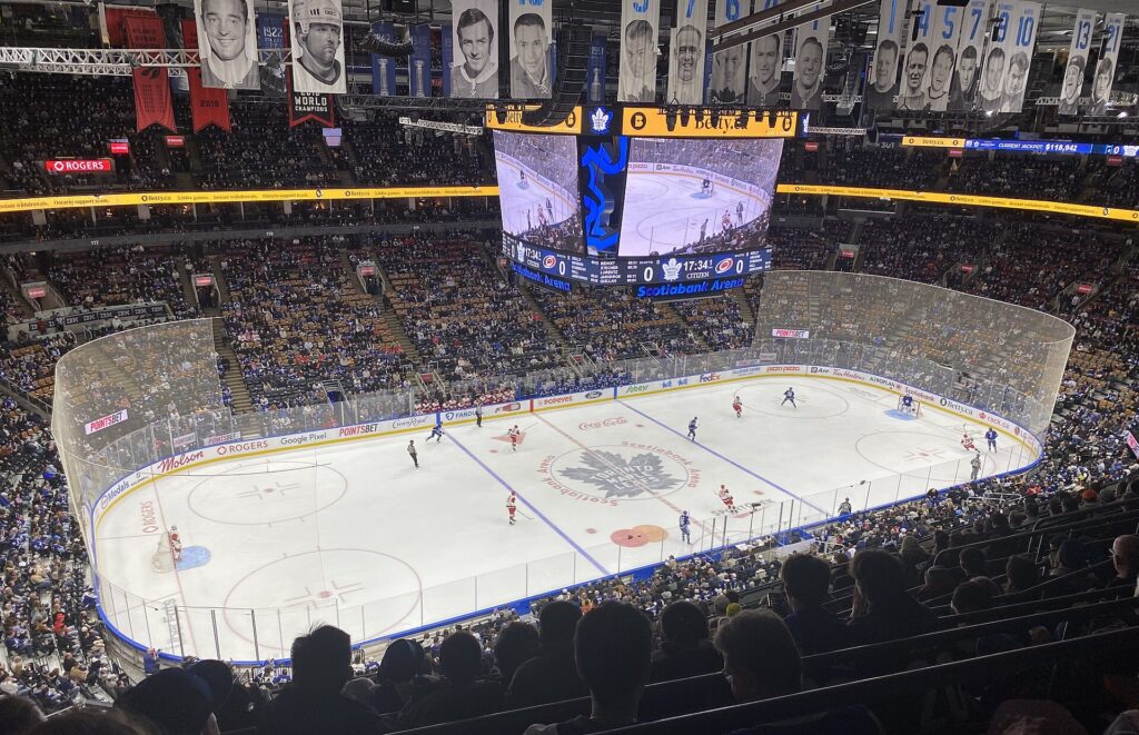 A hockey game in progress inside a packed Scotiabank Arena in Toronto