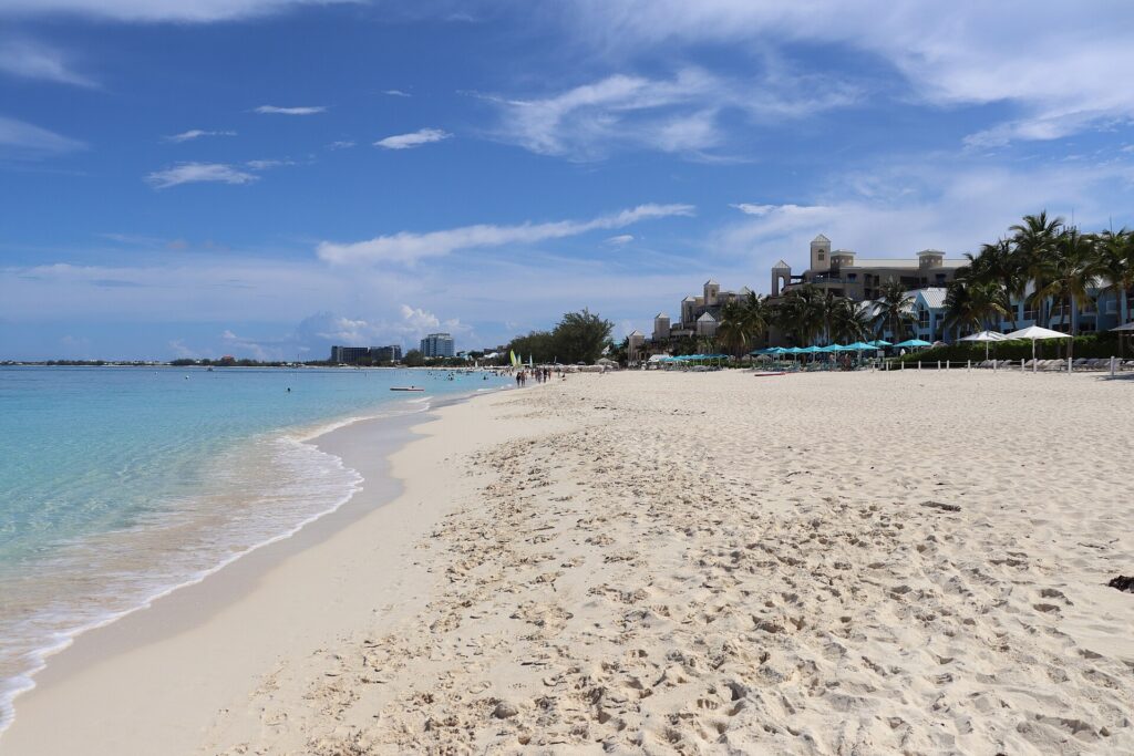 White sand and turquoise water along Seven Mile Beach on Grand Cayman