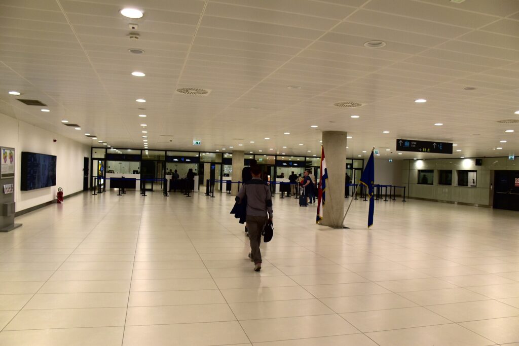Passport control desks in an airport arrivals hall