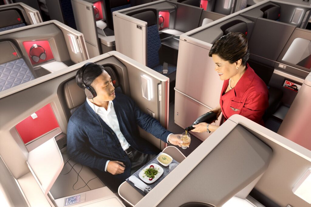 A lie-flat business class suite in a Delta One cabin
