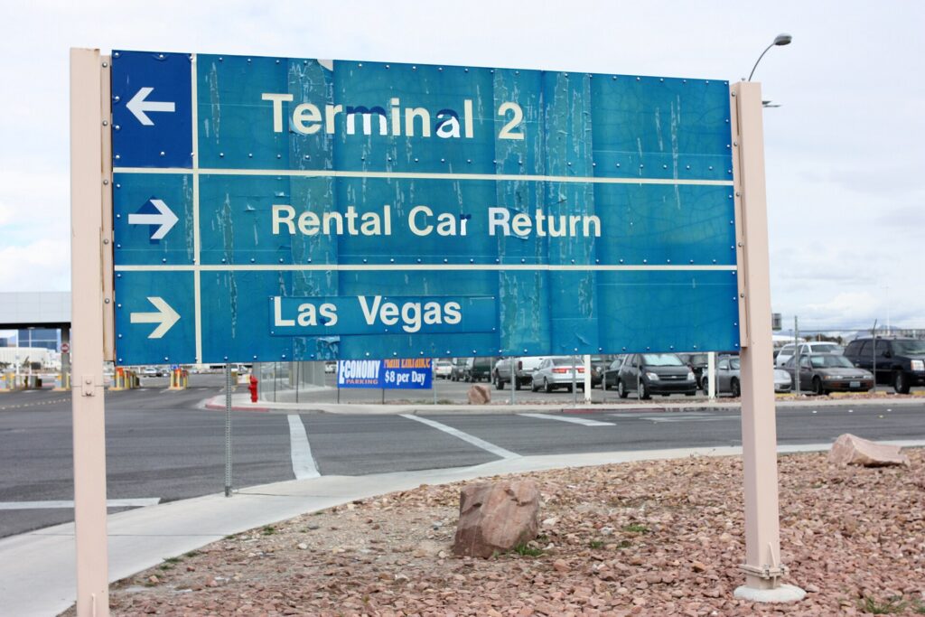 A road sign directing drivers to rental car return at the Las Vegas airport