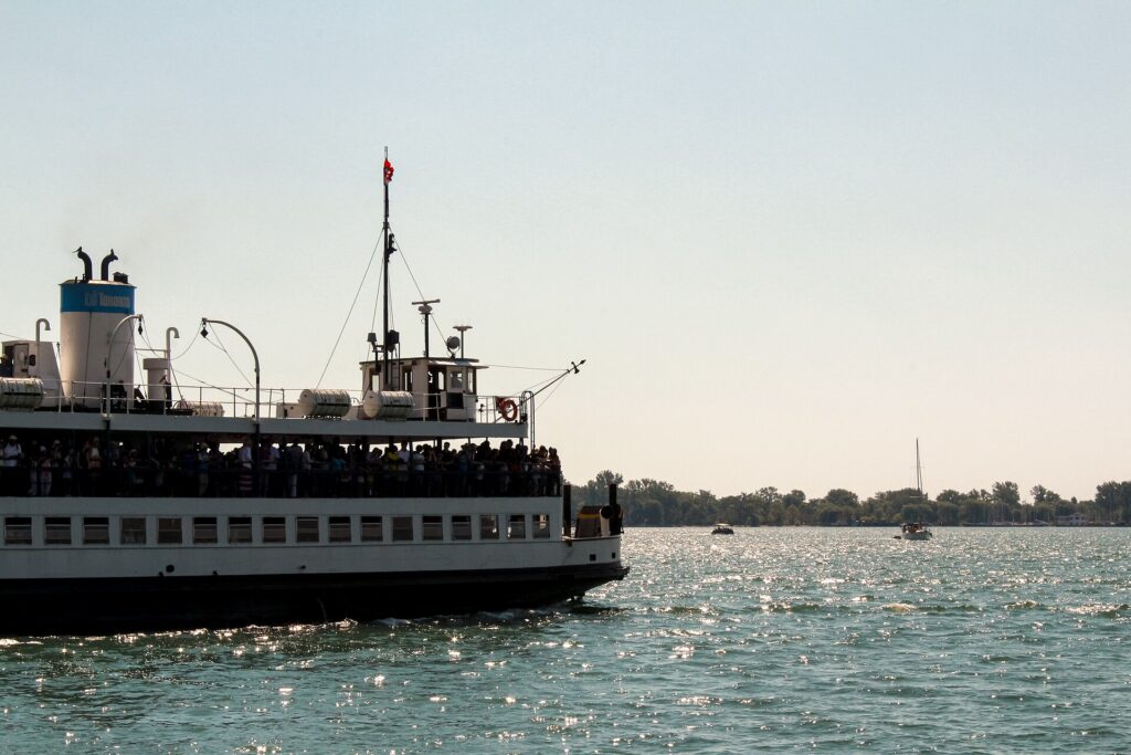 A ferry crossing Toronto harbor to the Toronto Islands