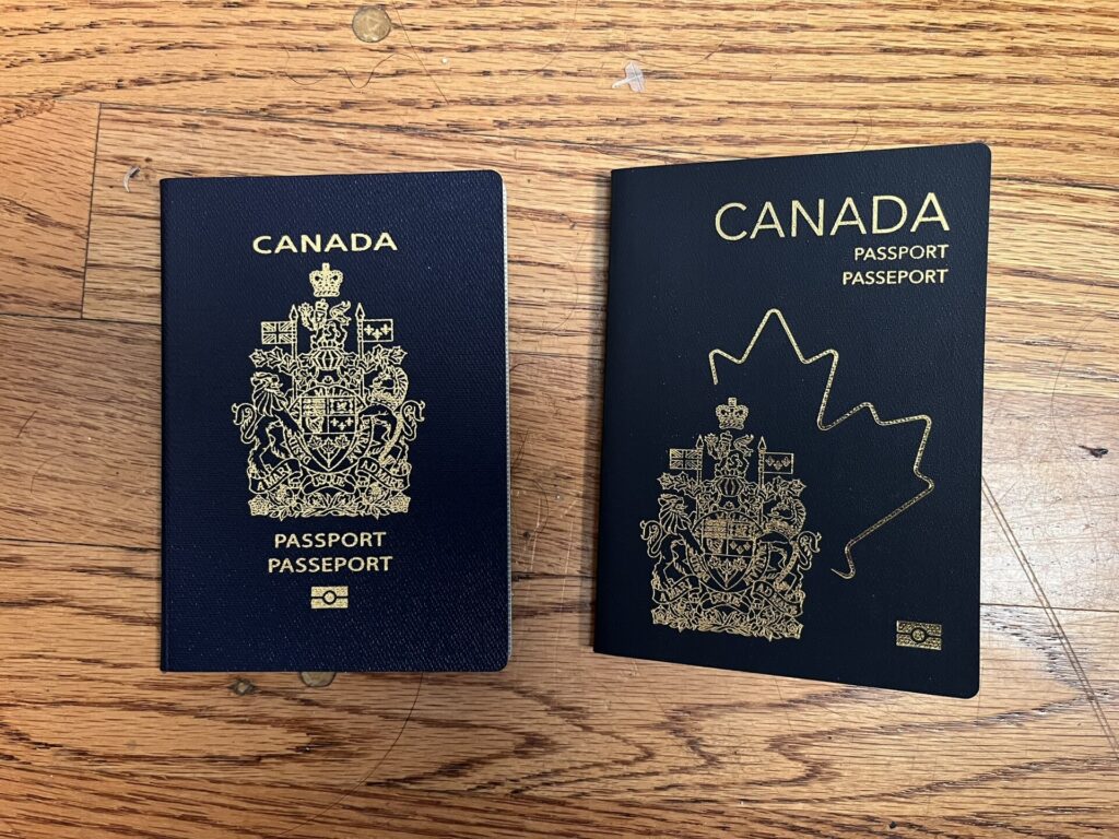 Two Canadian passports from older and newer series