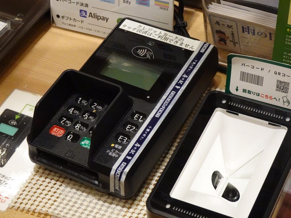 Card payment terminals for contactless and chip card payments at a shop counter