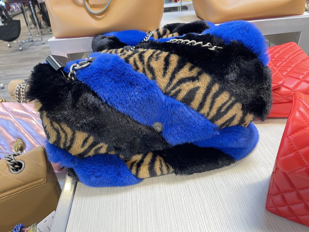 A small handbag on display in a store