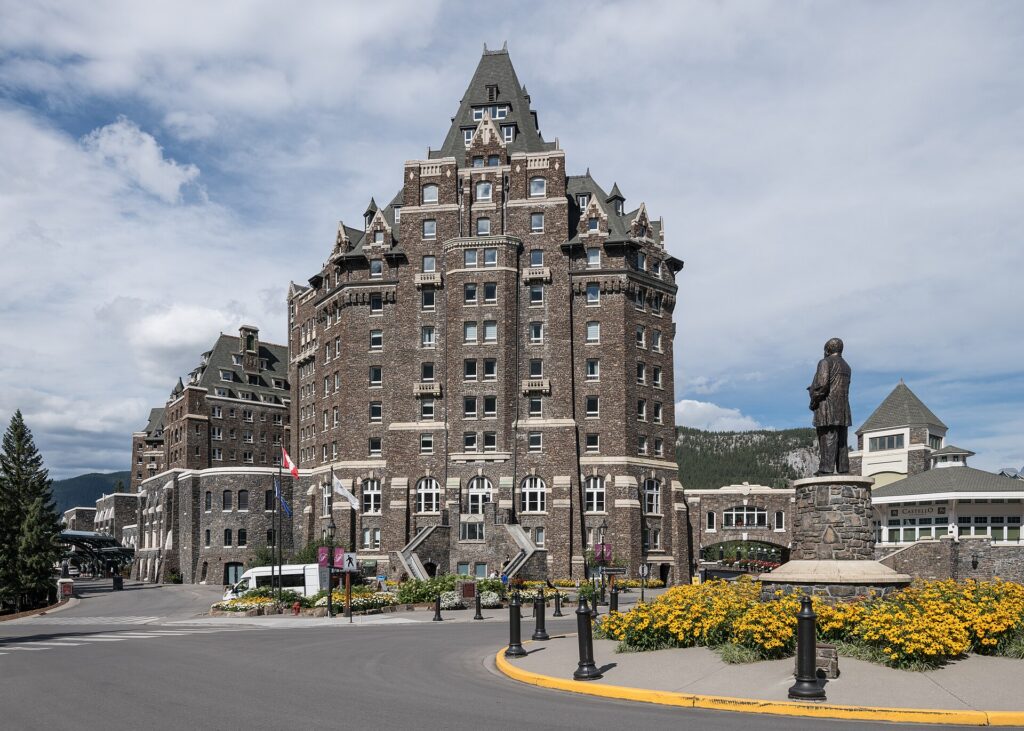 The Fairmont Banff Springs Hotel surrounded by forest and mountains