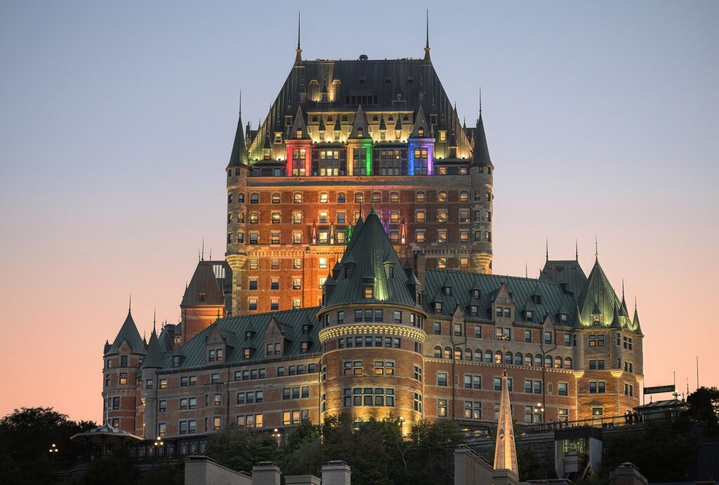 The Château Frontenac hotel lit up at dusk in Quebec City