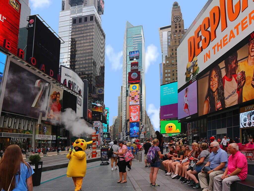 A dense crowd of tourists in Times Square, New York