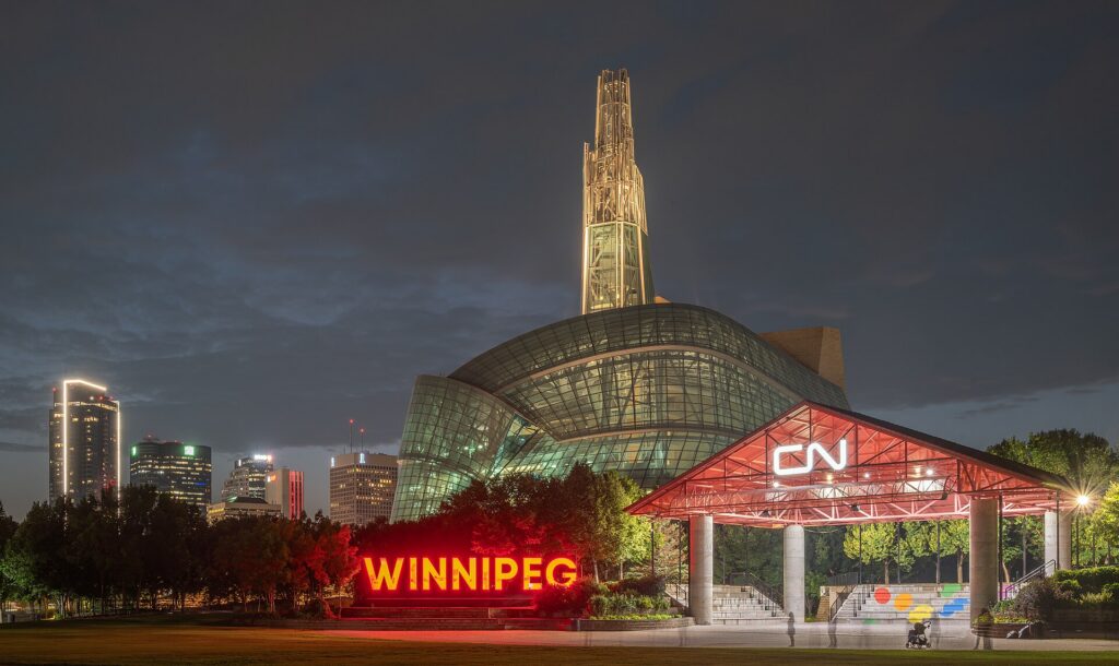 The Canadian Museum for Human Rights and the downtown Winnipeg skyline at night