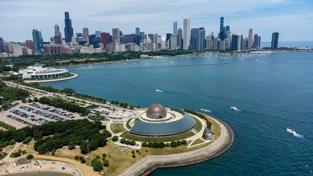The Chicago skyline across the water from the Adler Planetarium