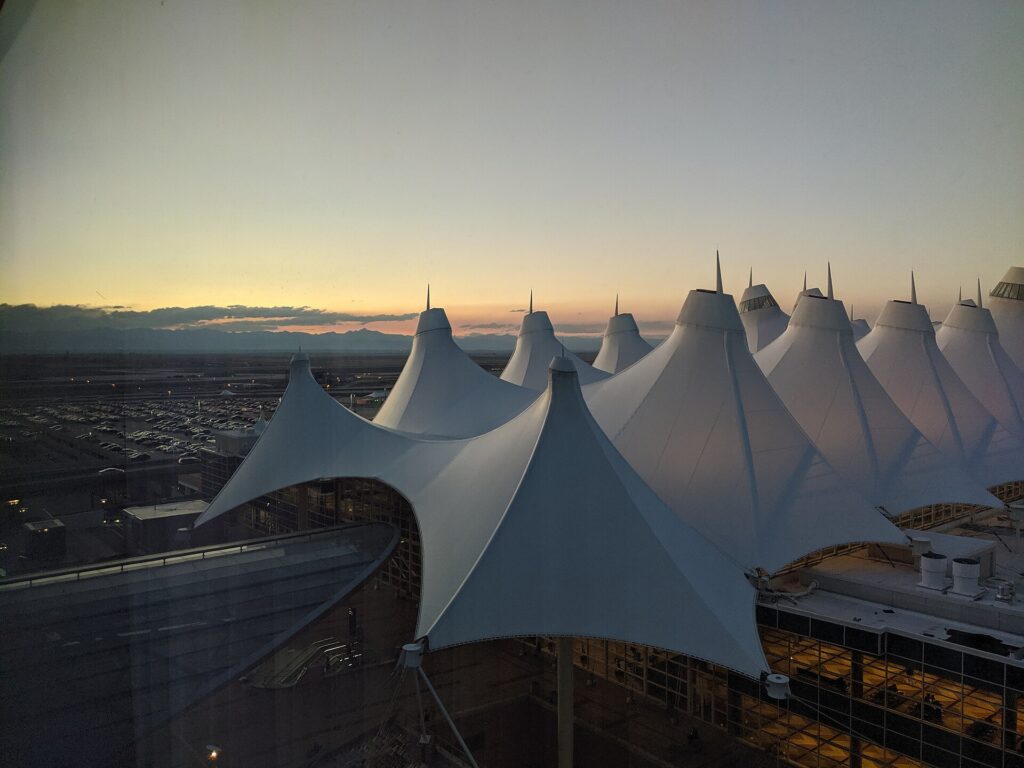 The peaked white tent roof of the main terminal at Denver International Airport