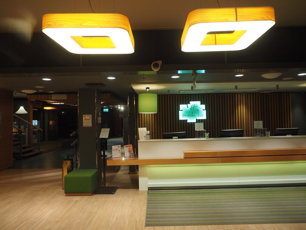 The reception desk in a city-center hotel lobby