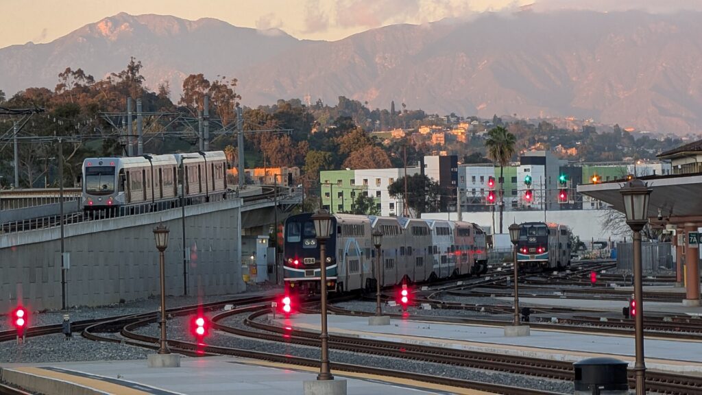 A Los Angeles Metro A Line train and Metrolink trains at Union Station