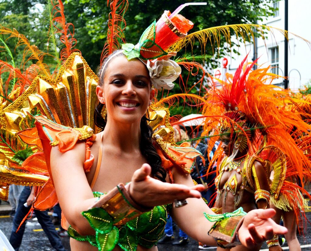 Performers in costume at the Notting Hill Carnival in west London
