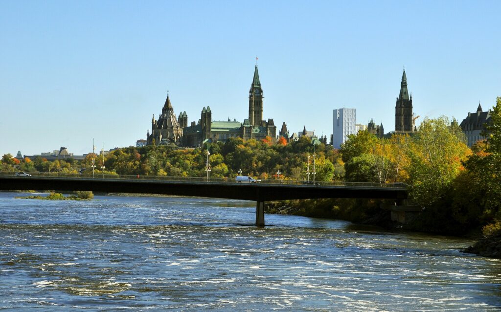 Parliament Hill and the Ottawa skyline seen across the Ottawa River