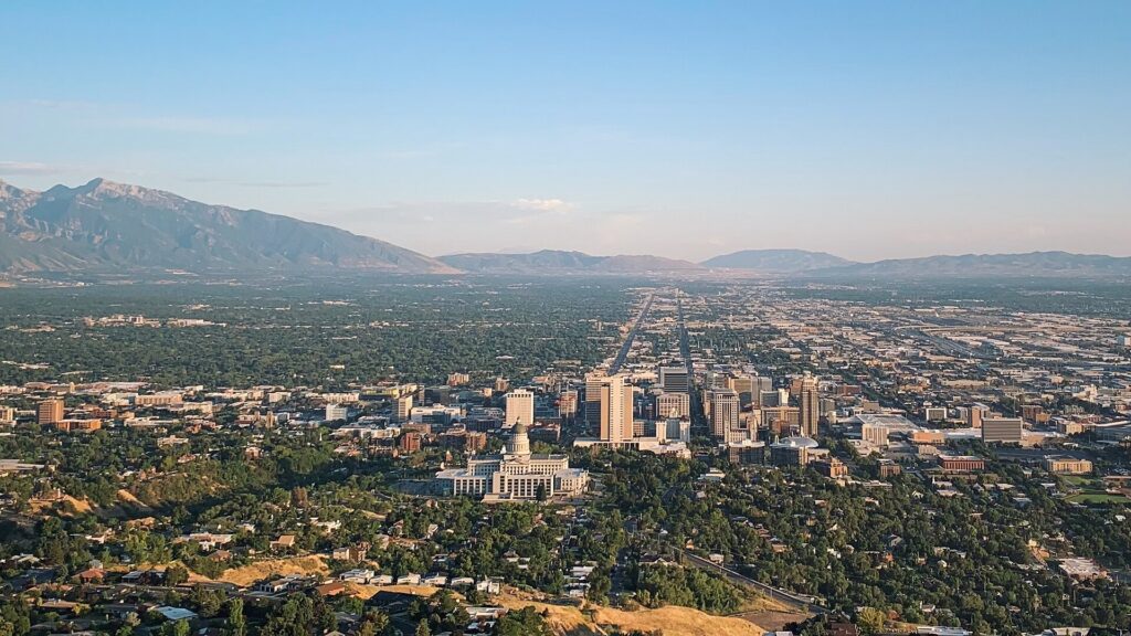 The Salt Lake City skyline with the snow-capped Wasatch Range beyond