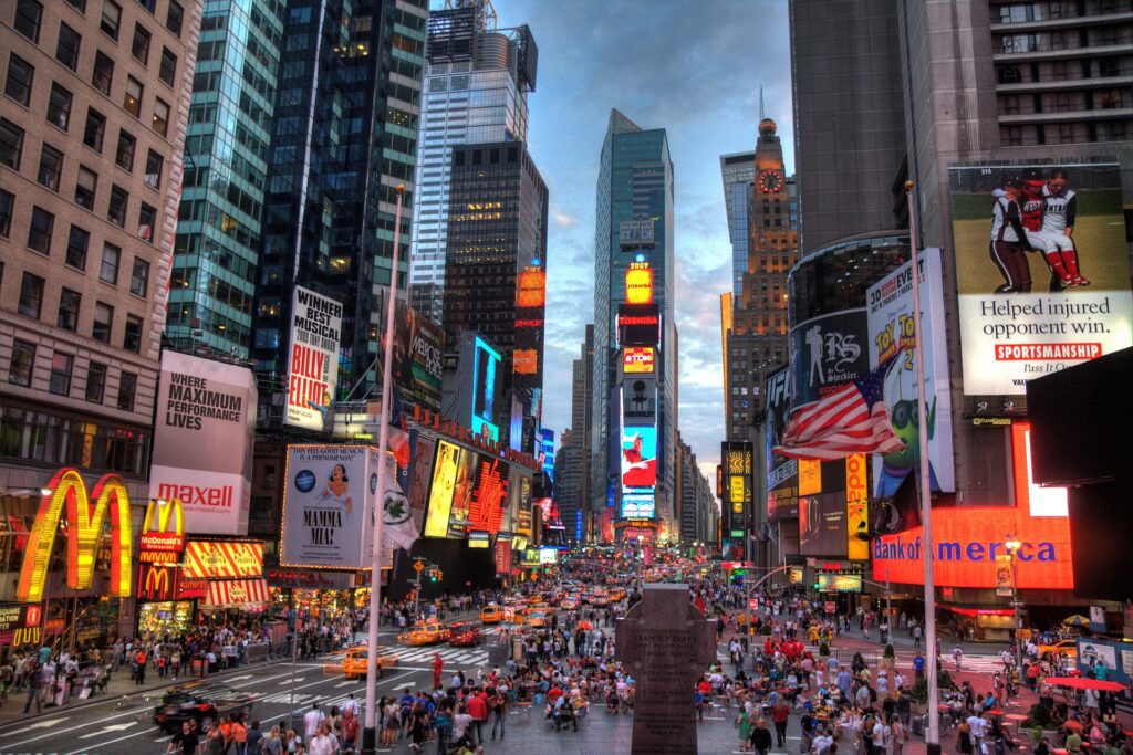 Times Square in Midtown Manhattan, lit by its screens