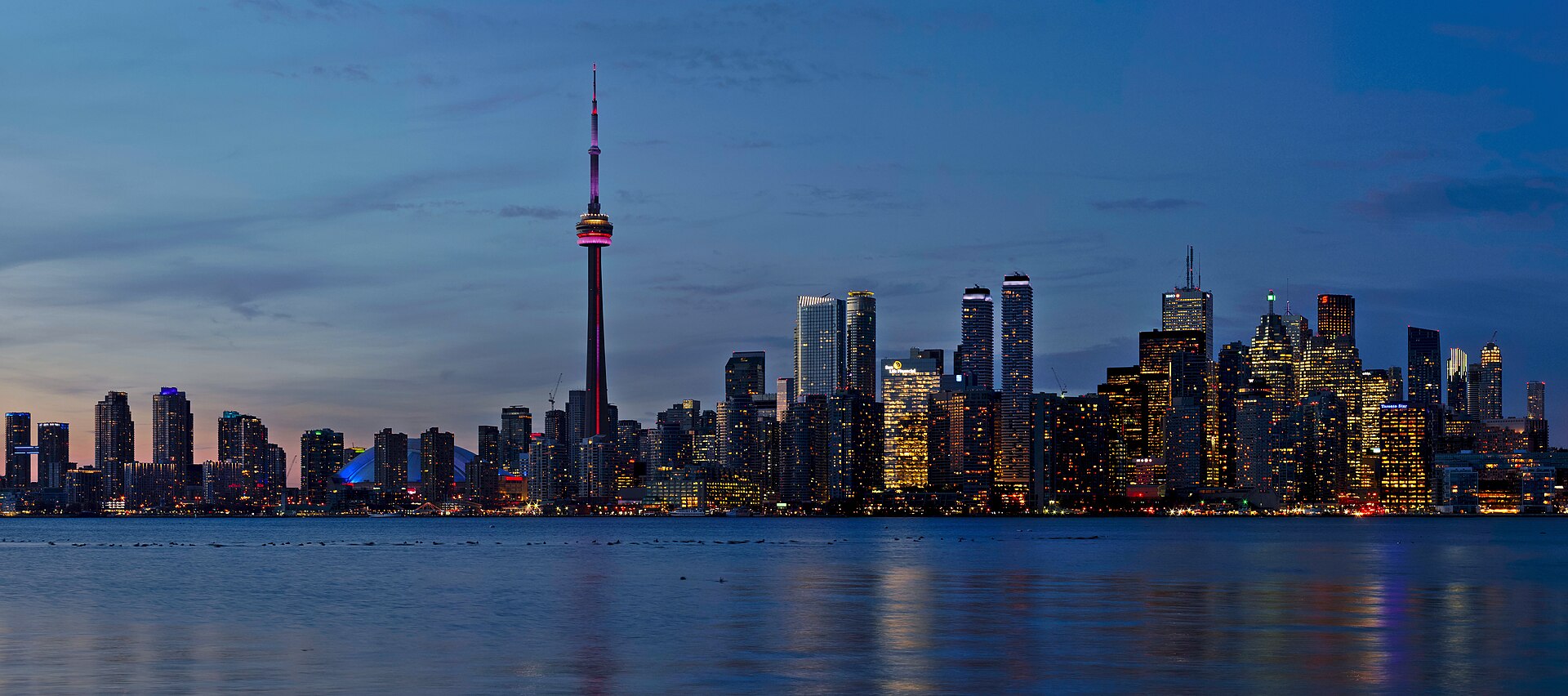Toronto skyline and CN Tower at sunset seen from the Toronto Islands