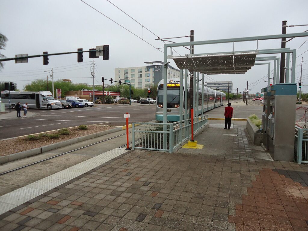 A Valley Metro light rail train approaching a station in downtown Phoenix