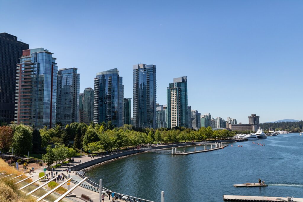 The downtown Vancouver skyline and harbour with the North Shore mountains behind